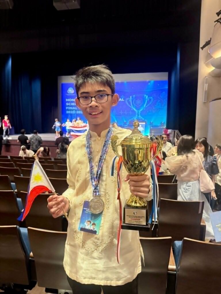 Noah Janrei S. Corvite celebrating his mathematics and science olympiad achievements for SY 2025-2026